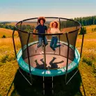 Батут каркасный 360см (12фут), SCHOLLE, FLIP, с защитной сеткой и лестницей, зеленый